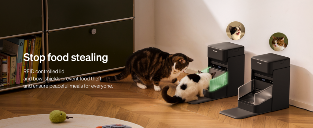 Two cats beside PETLIBRO One RFID feeders with collar-controlled bowl access